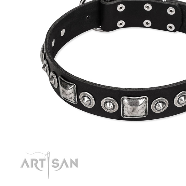 Leather dog collar made of flexible material with embellishments