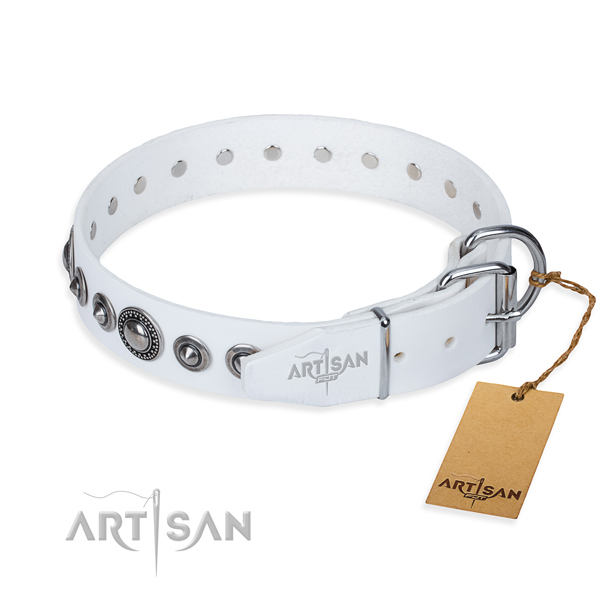 Natural genuine leather dog collar made of gentle to touch material with durable adornments
