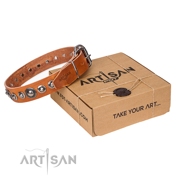 Leather dog collar made of soft to touch material with rust-proof D-ring